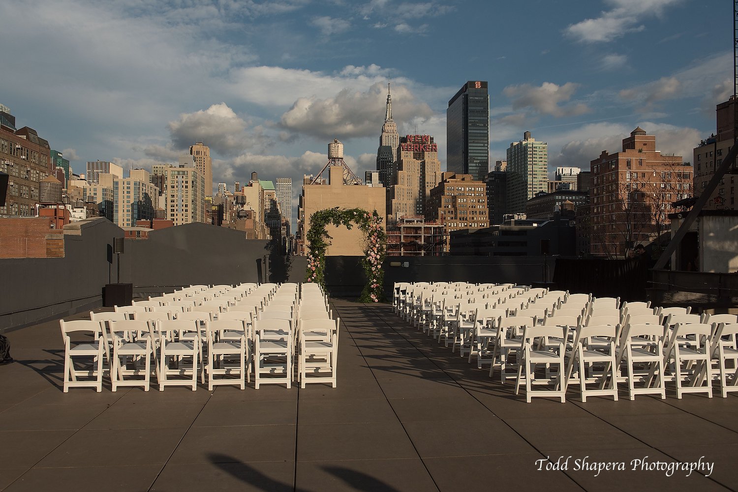 ceremony structure chuppah green white peach rooftop 2.JPG