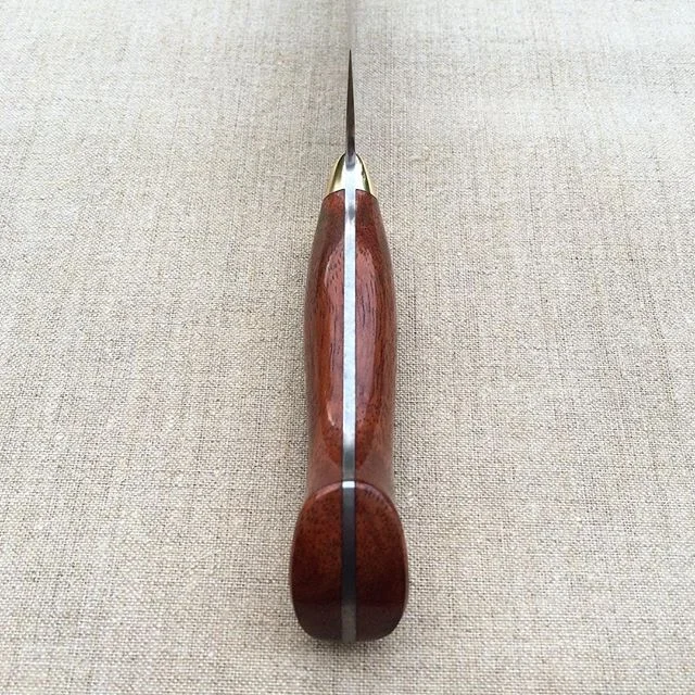 Detail- western-style chef knife handle.