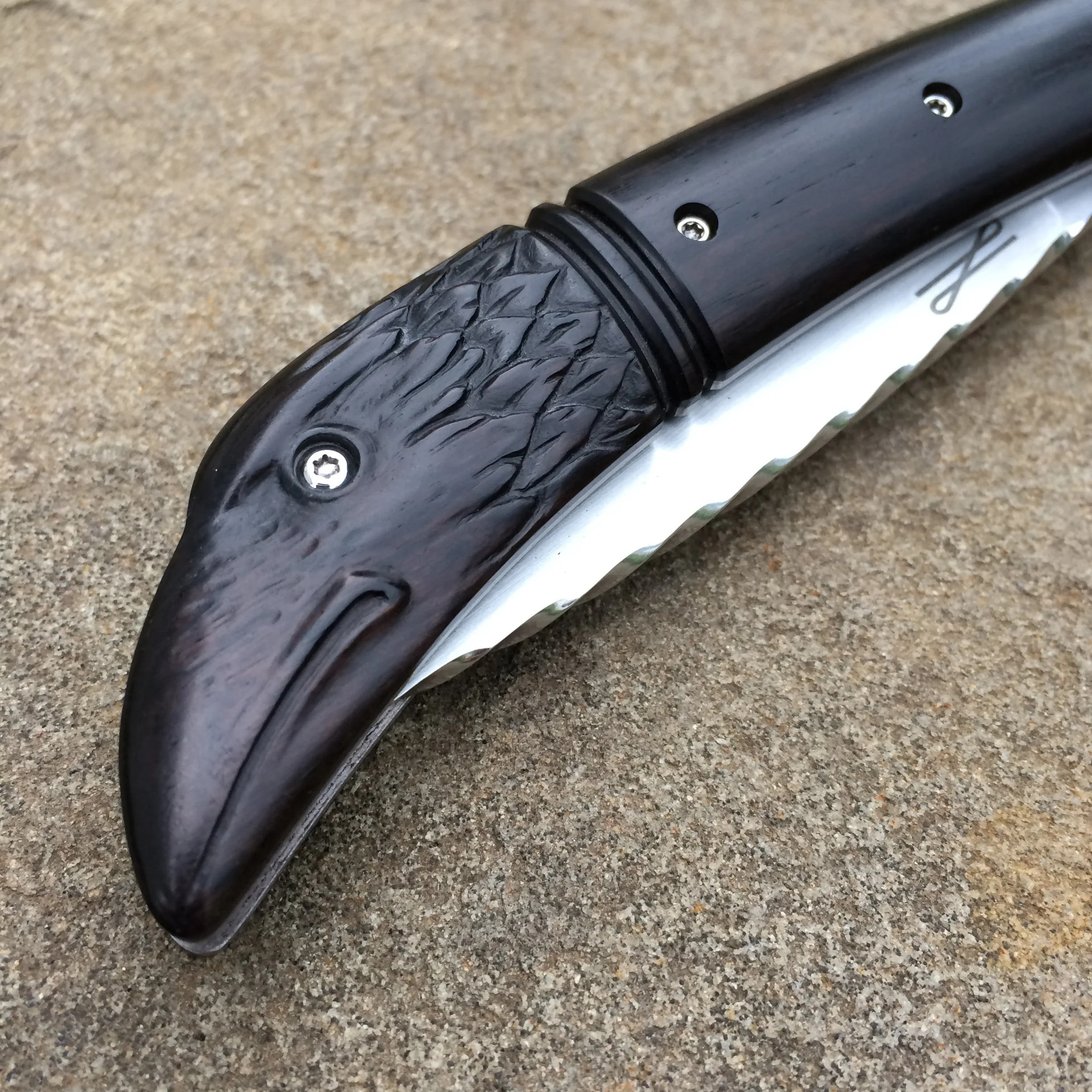 Detail of raven head carving.