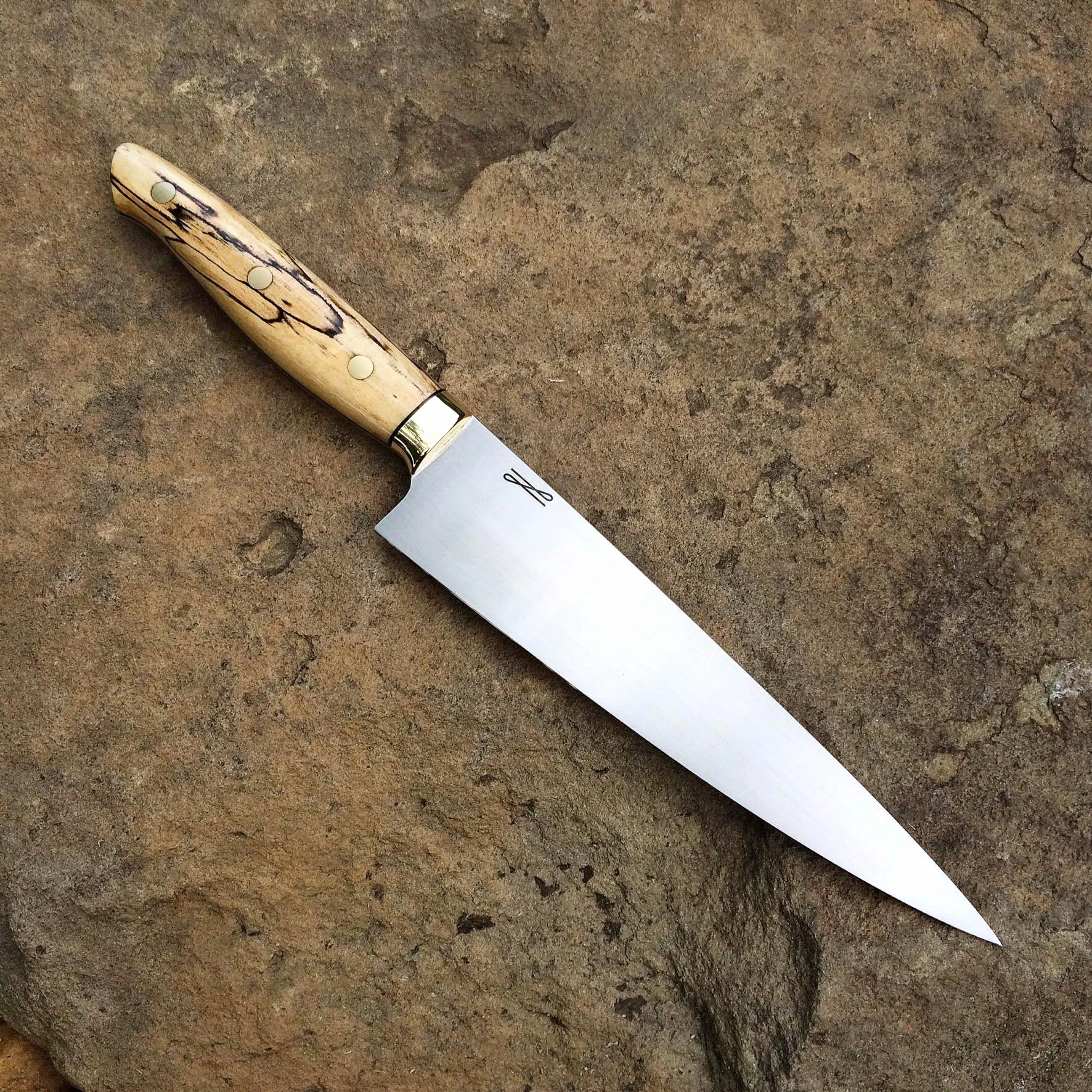 7" cook's knife, 52100, spalted maple, brass, black liners.