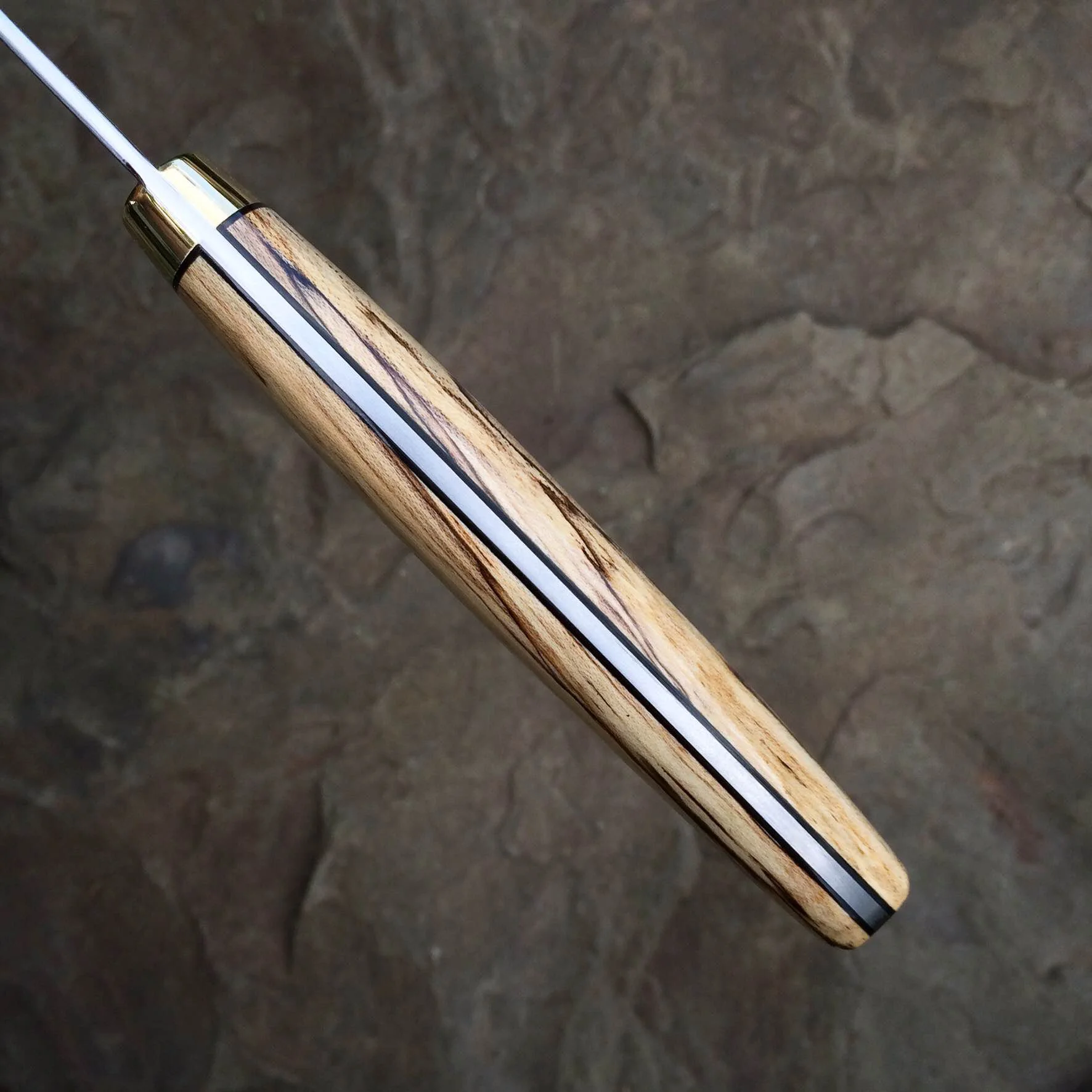 Detail of spalted maple and liners.