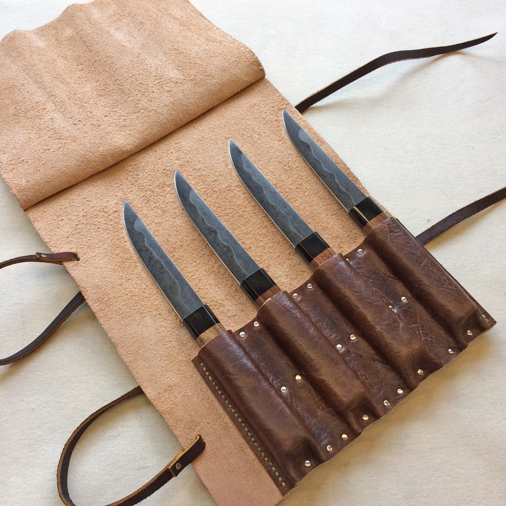Leather roll for steak knife set. 4oz. veg-tanned leather, milled for suppleness, hand-stitched and riveted.