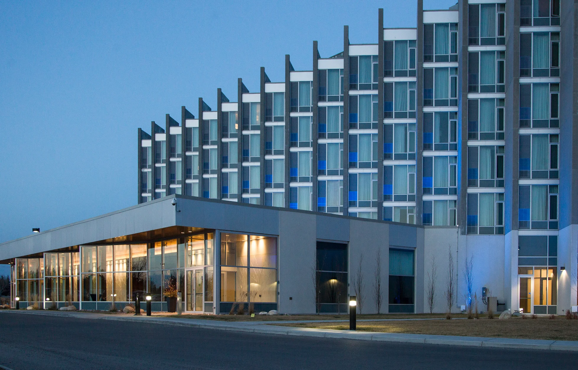 Alumicor 2500 series curtainwall with SSG, Alumicor 970 series windows, Alumicor doors, aluminum panels