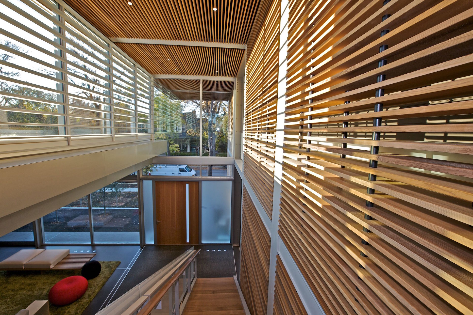 Wood pivot door, aluminum details