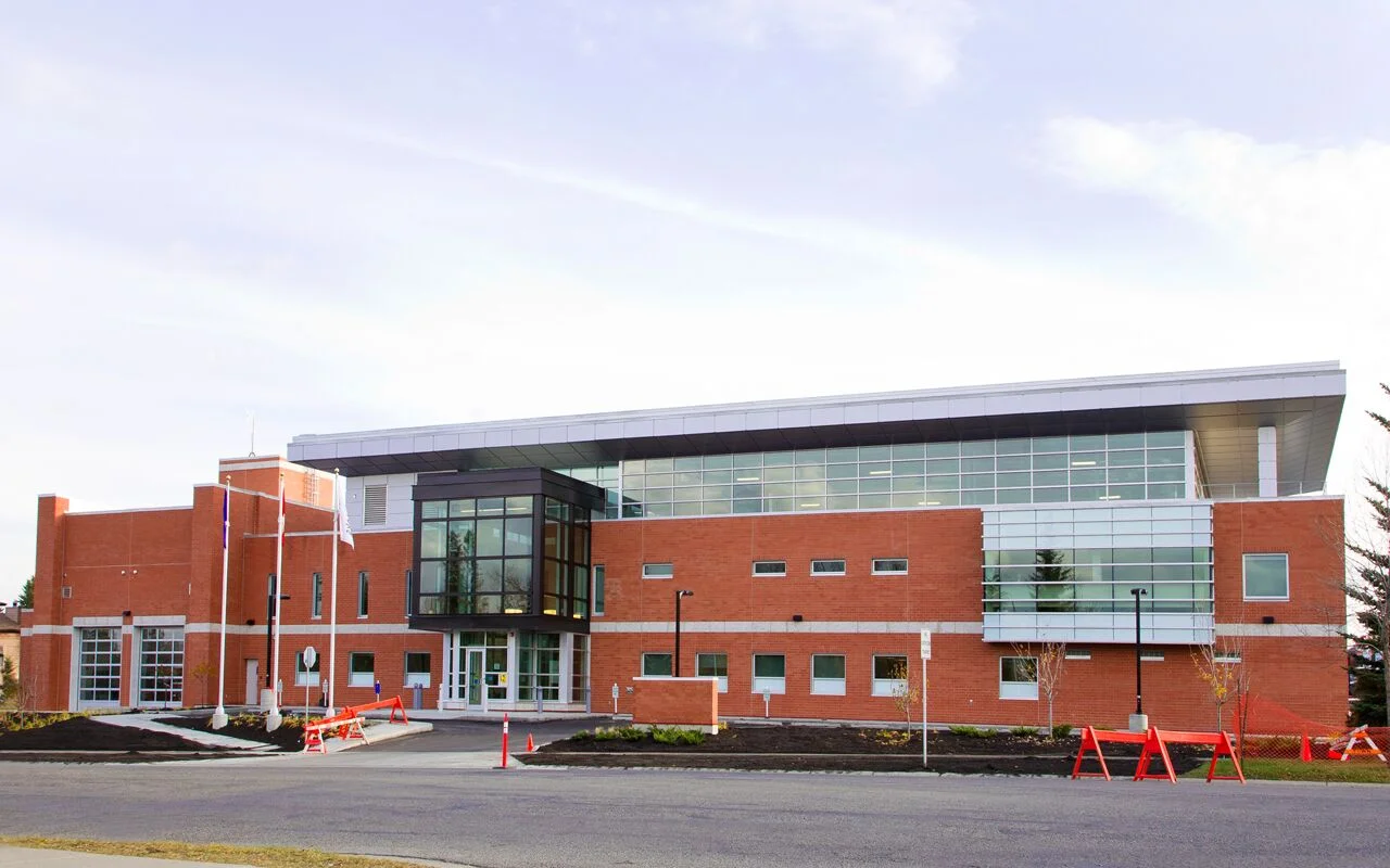 Alumicor triple-glazed 2600 series curtainwall with SSG, Alumicor doors, 1800 series vestibule, 2300 series skylight, black exterior cladding