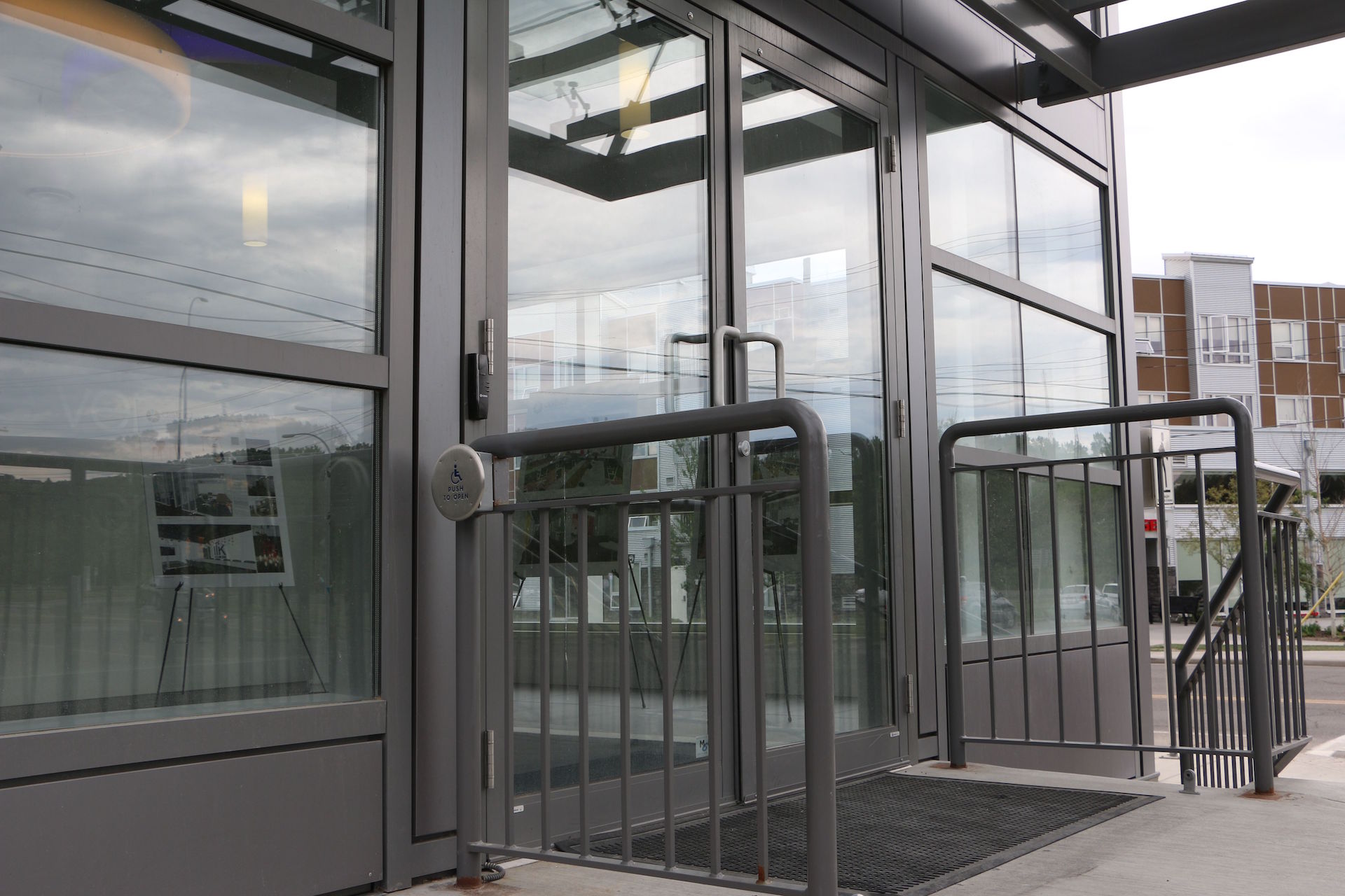 Alumicor 2500 series curtainwall with custom phenolic panels and spandrel, Alumicor doors