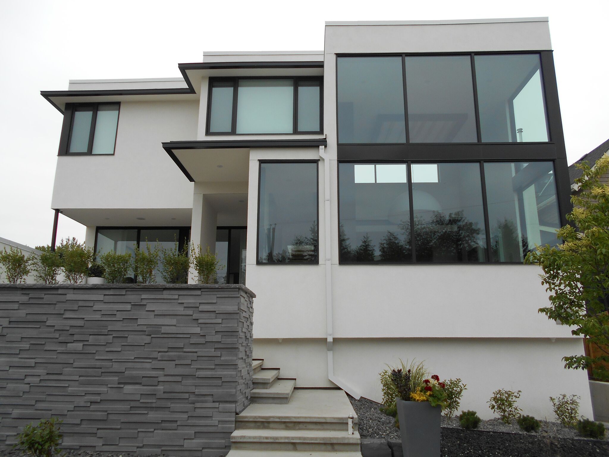 Alumicor 1990 series windows, 1350 vents and Fleetwood 12' tall sliding doors