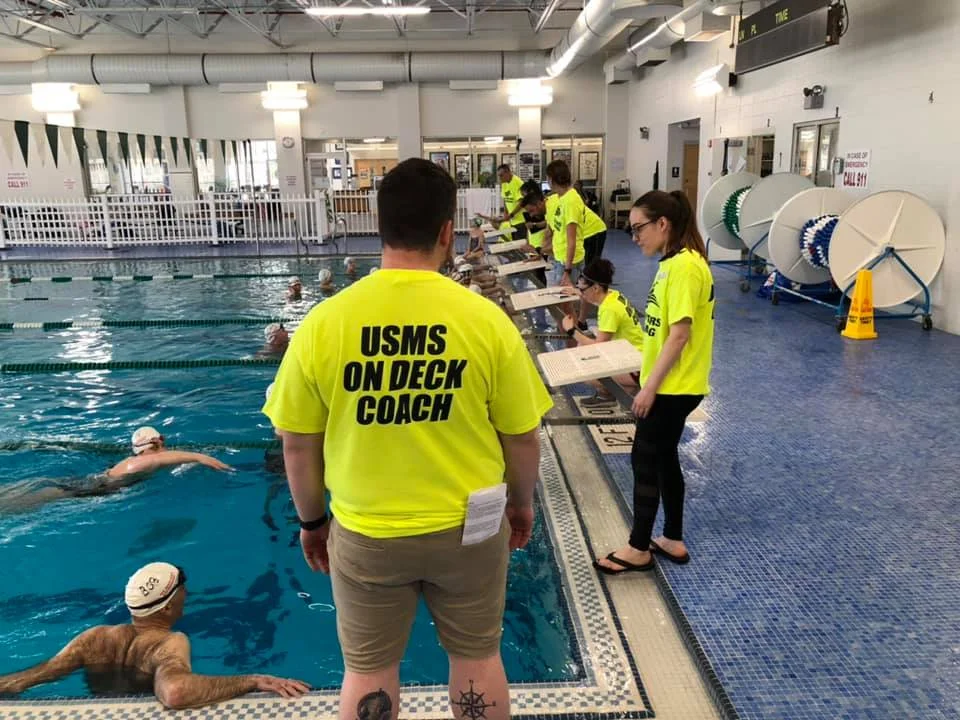 Coaches got hands-on experience during the in-water portion of the Clinic Course for Coaches while swimmers got a USMS Stroke clinic