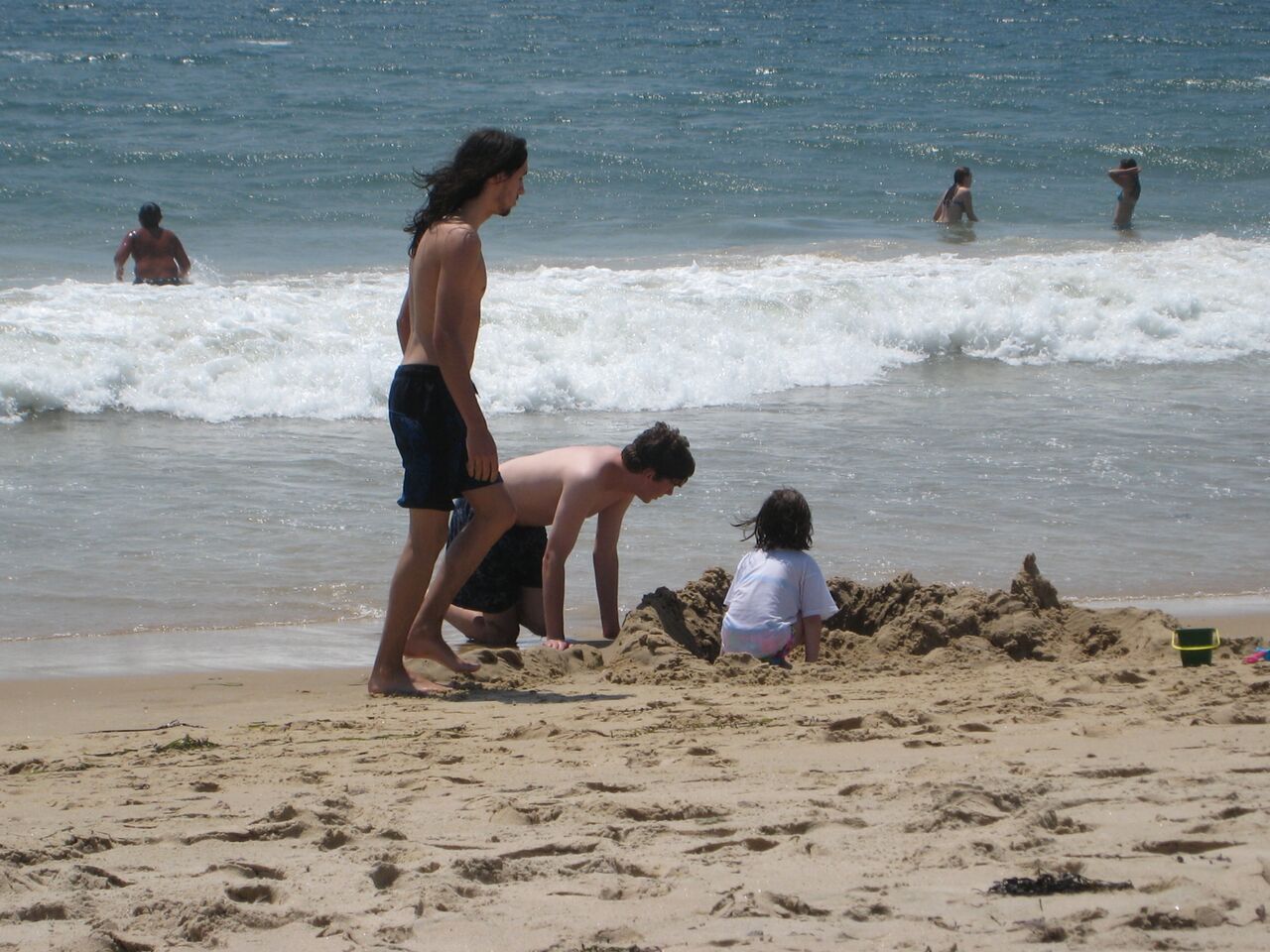 The Simpson children enjoy the sandy beach