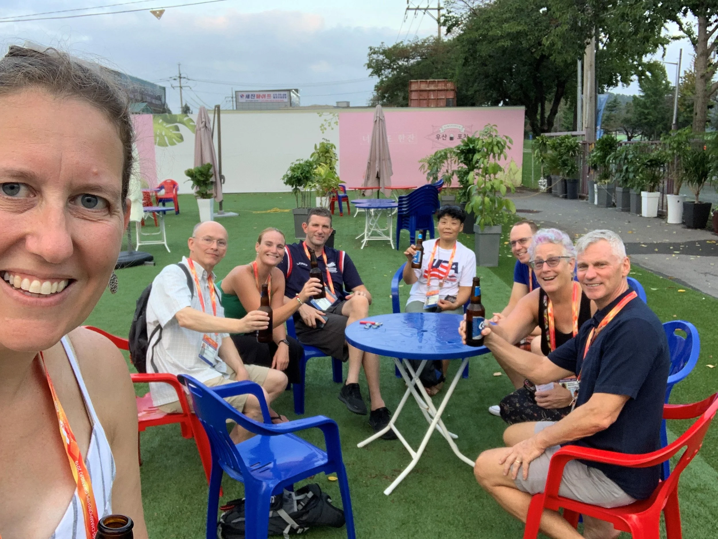 New England entourage having a beer while waiting for a cab to a traditional Korean BBQ joint. L to R: Kysa Crusco, Mark Kiel, Mindy Williams, Seth Grady, Bo Hatfield, Len van Greuning, Liz MacBride, and "No Seat Pete" - a new British friend