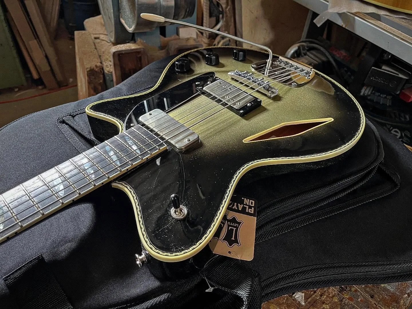 Ryan picked up his custom baritone. Part Superglide Almighty, part Supercub, all super cool. Featuring vintage yellowed silver burst, @masterybridge, @haramismusicalhardware Koll knobs, @g_gotoh510 tuners #guitarsmadeinportland #baritoneguitar@gemini