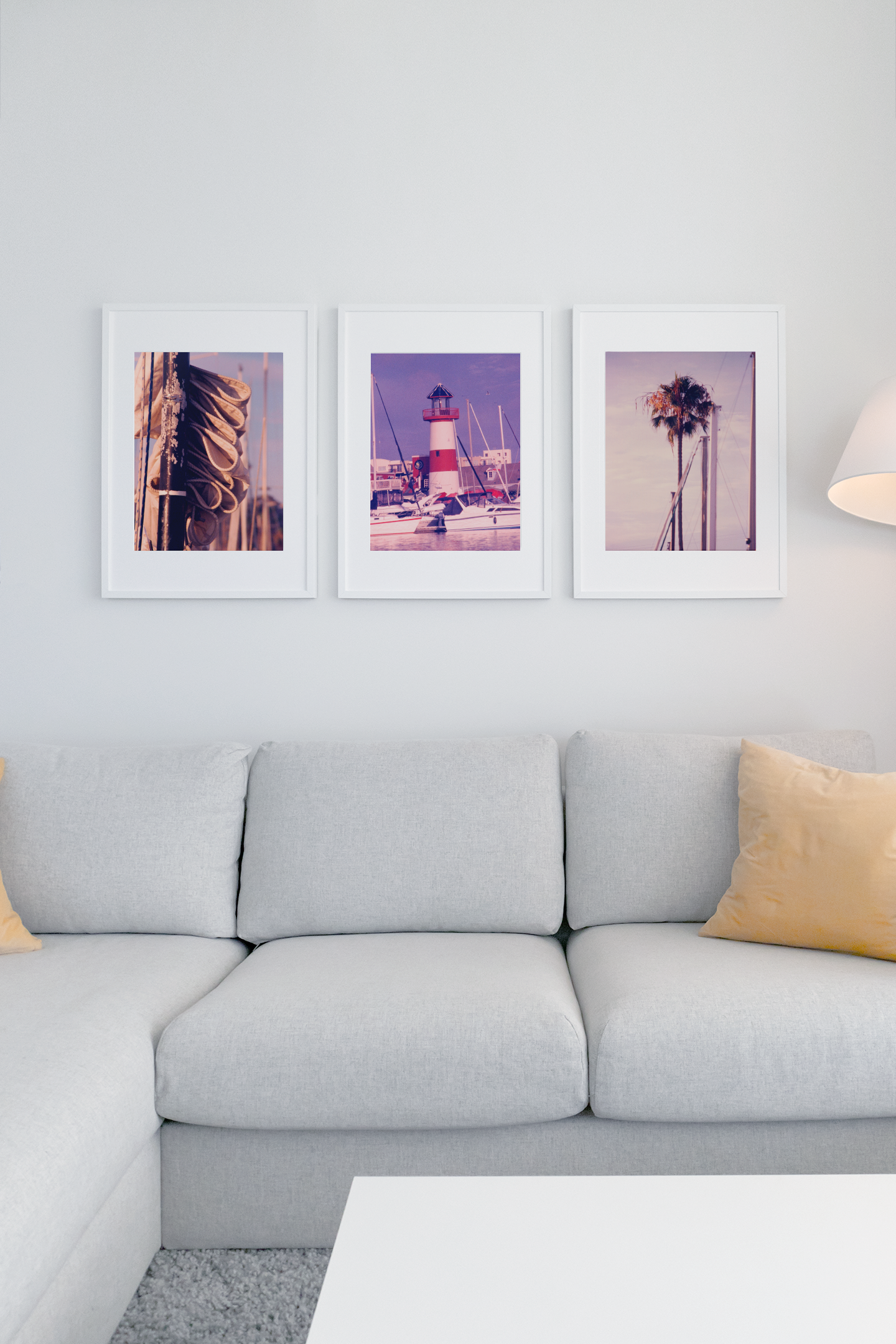 mockup-featuring-three-poster-frames-hanging-over-a-couch-549-el.png