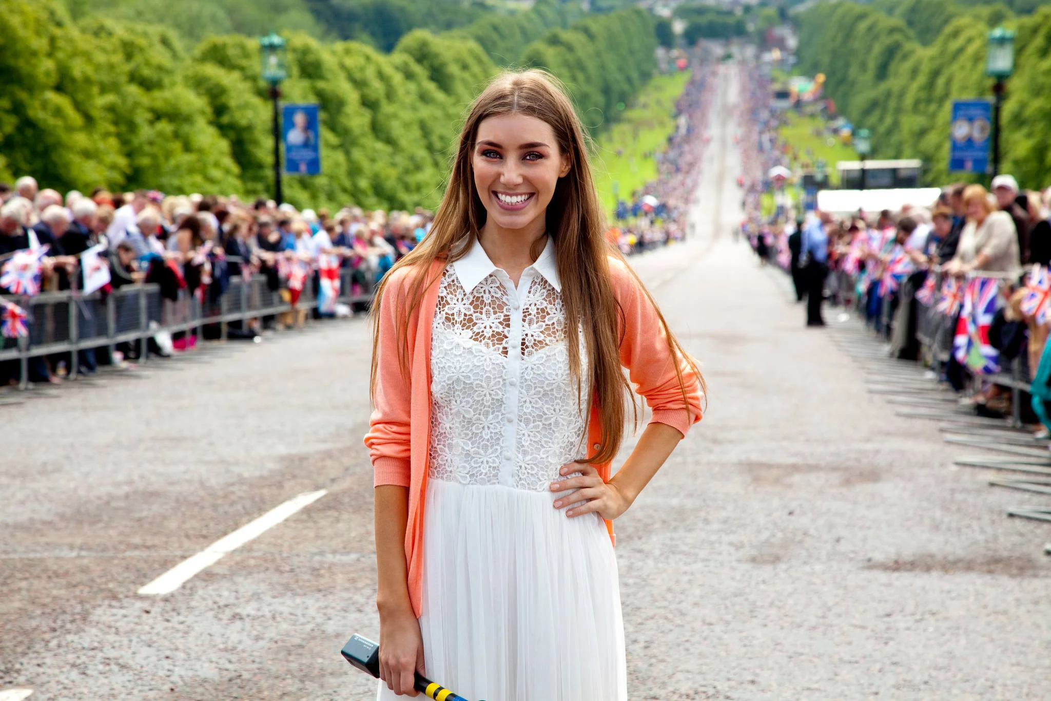 6. Katie Larmour announcing the arrival of Queen Elizabeth for the Diamond Jubilee Garden Party Celebrations at Stormont Parliament Buildings, Northern Ireland to crowds gathered of thousands.jpg
