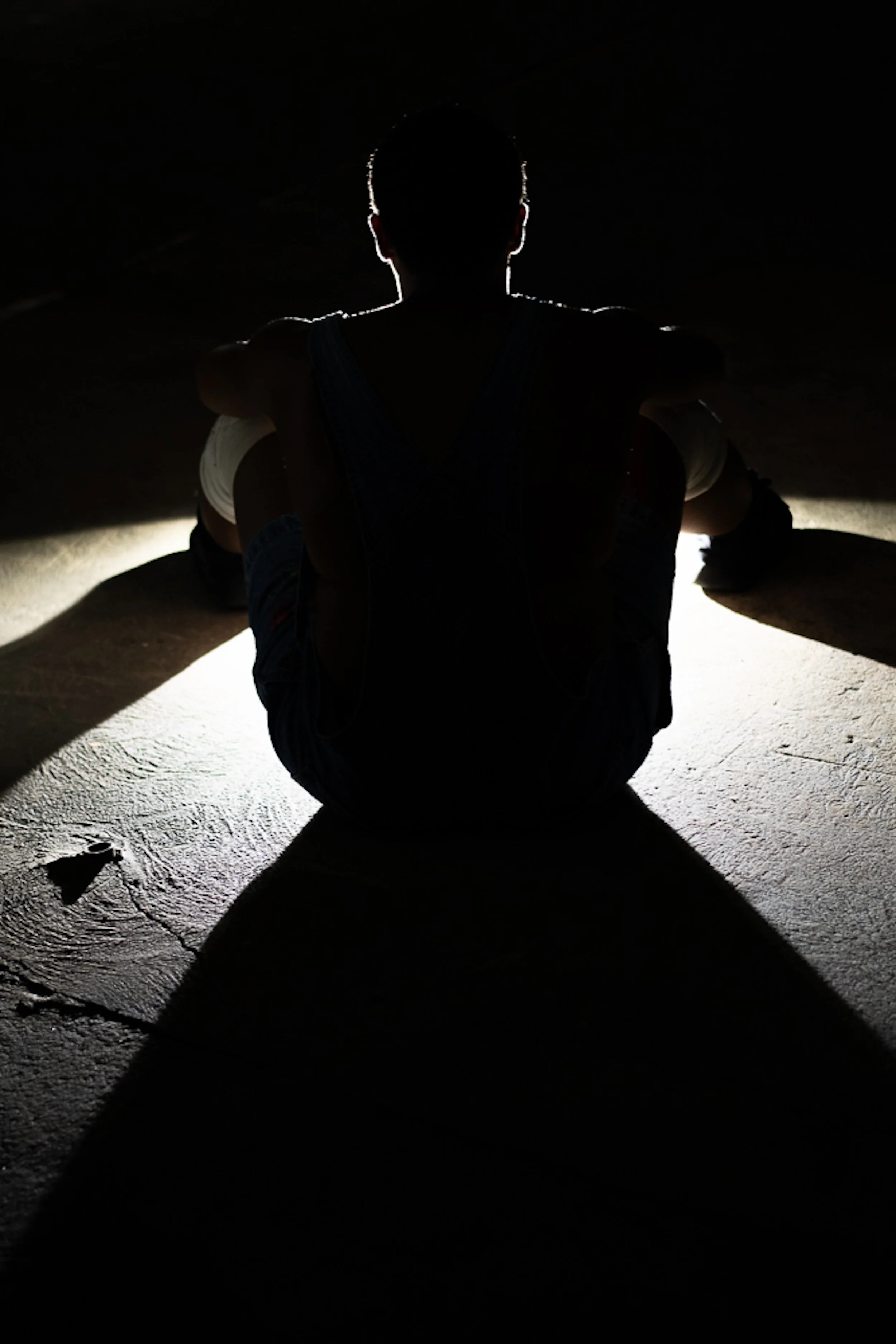 Breeanah Breeden's shadow in front of light, photo by Umi Akiyoshi.