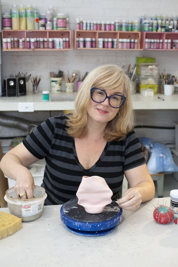 KATHY BUTTERLY: 2012 Winner of the Smithsonian American Art Museum Contemporary Artist Award
Kathy Butterly is the tenth annual winner of the museum’s contemporary artist award.
Butterly was recognized by an independent panel of jurors as an inventive and independent sculptor whose work reflects the fading boundary between craft and contemporary art.
The jurors wrote in their decision: “Butterly’s voluptuous ceramic objects explode traditional conceptions of earthenware art through careful manipulation of the medium, resulting in unconventional forms, colors, and surfaces. Her small, nuanced, labor-intensive sculptures are richly communicative and wildly imaginative. Each enigmatic work balances between humor and horror, seduction and repulsion, abstraction and figuration. Butterly masterfully harnesses these tensions to transform the familiar into something new and strange. She stands out as one of the most innovative artists of her generation.”
Butterly creates intimate ceramic sculptures that explore the physical and emotional potential of clay. Her exquisitely glazed objects, which range from three to ten inches high, resemble cartoonish forms based on the human body. The sculptures are often cast from mundane kitchen objects and then endowed with appendages such as bulging bellies, curvaceous bottoms, and painted toes. Butterly’s process is both painstaking and unorthodox. Often a single piece will be glazed and fired in the kiln as many as twenty times, resulting in a sensually colored surface that conveys as much as it conceals.
Her work has steadily gained recognition in the United States, with recent solo exhibitions at the Shoshana Wayne Gallery in Santa Monica, California, Tibor de Nagy Gallery in New York City, and The Frances Young Tang Teaching Museum and Art Gallery at Skidmore College in Saratoga Springs, New York. Butterly was a 2011 recipient of the Pollock-Krasner Foundation Grant. Among other awards she has received are a Painters & Sculptors Grant from the Joan Mitchell Foundation (2009) and the Ellen P. Speyer Award from the National Academy of Art in New York City (2006).
Butterly was born in 1963 in Amityville, New York. She received a bachelor’s degree in fine arts (1986) from Moore College of Art in Philadelphia and earned a master’s degree in fine arts (1990) from the University of California, Davis. She is represented by Tibor de Nagy Gallery and the Shoshana Wayne Gallery.