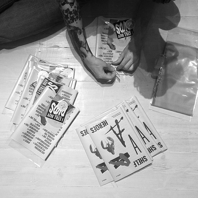 Packaging up Issue A with stickers