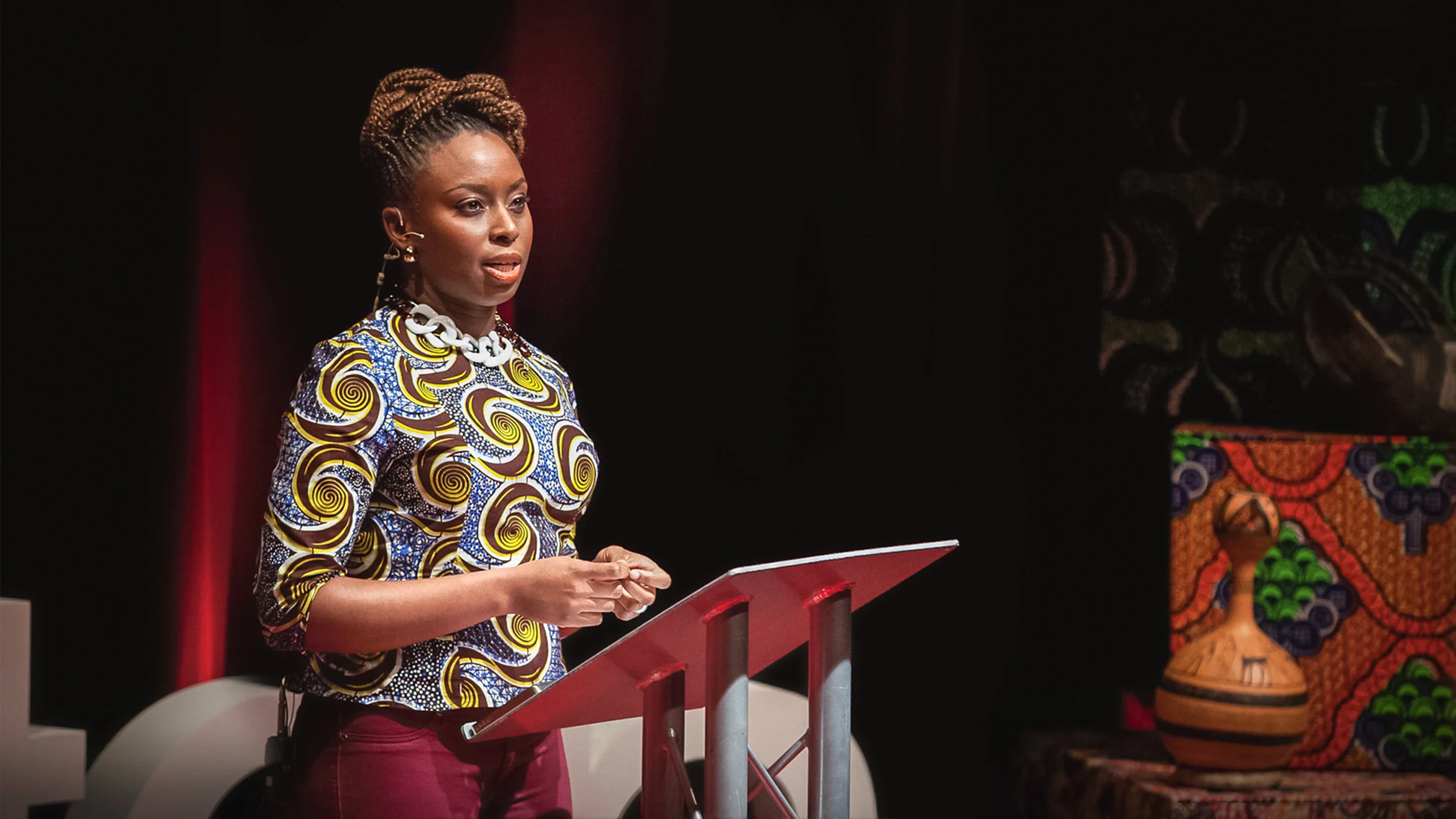 Chimamanda Ngozi Adichie speaking at her “We Should All Be Feminists” TED Talk in 2012