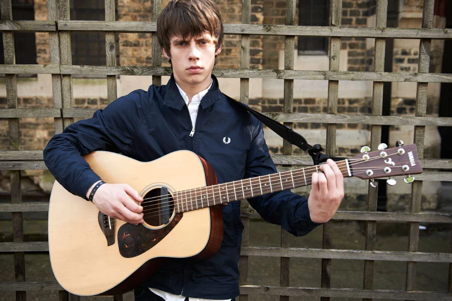 Jake Bugg, pictured here wearing a Fred Perry jacket, is an example of a contemporary musician inspired by the mods.
