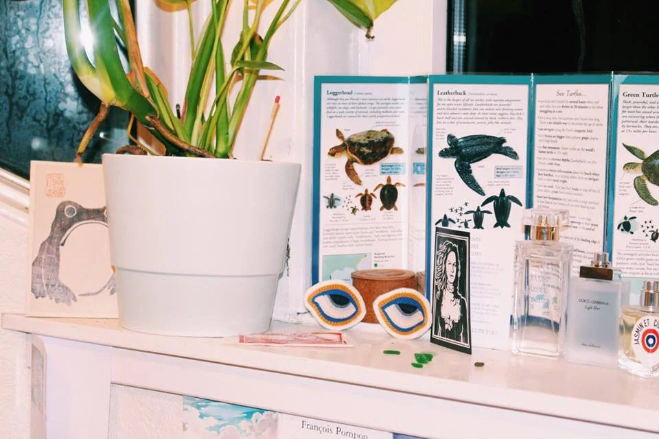 A collection of some of Molly’s perfumes alongside her various trinkets.