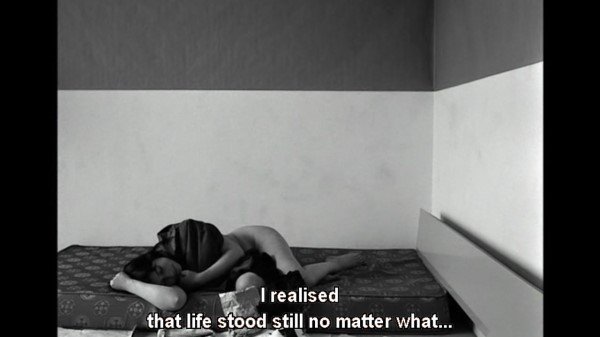 Bare Feet on Cold Walls With the Bedside Table as Your Only Friend: Melancholy and Loneliness in the Films of Chantal Akerman