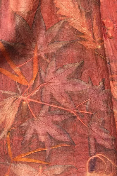 Botanical print on madder dyed silk by student Marina, 2017.