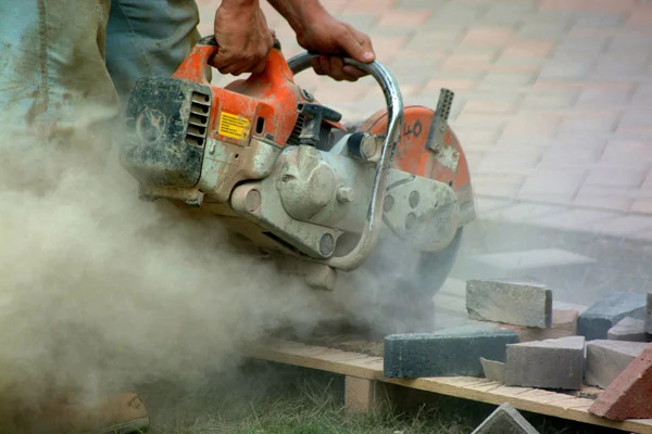 The worker in this photo is exposed to potentially dangerous levels of silica dust. Courtesy: Atlantic Environmnetal