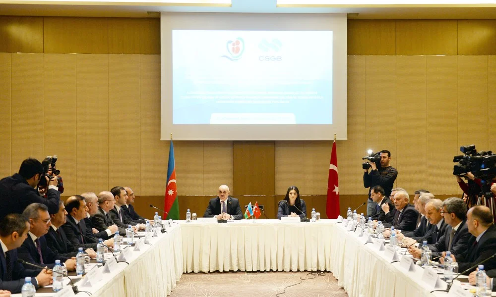 Azerbaijan's Salim Muslumov and Turkey's Julide Sarieroglu sit at the head of the table at the protocol signing ceremony in Baku, Azerbaijan on 1 February, 2018. Courtesy: Azertag