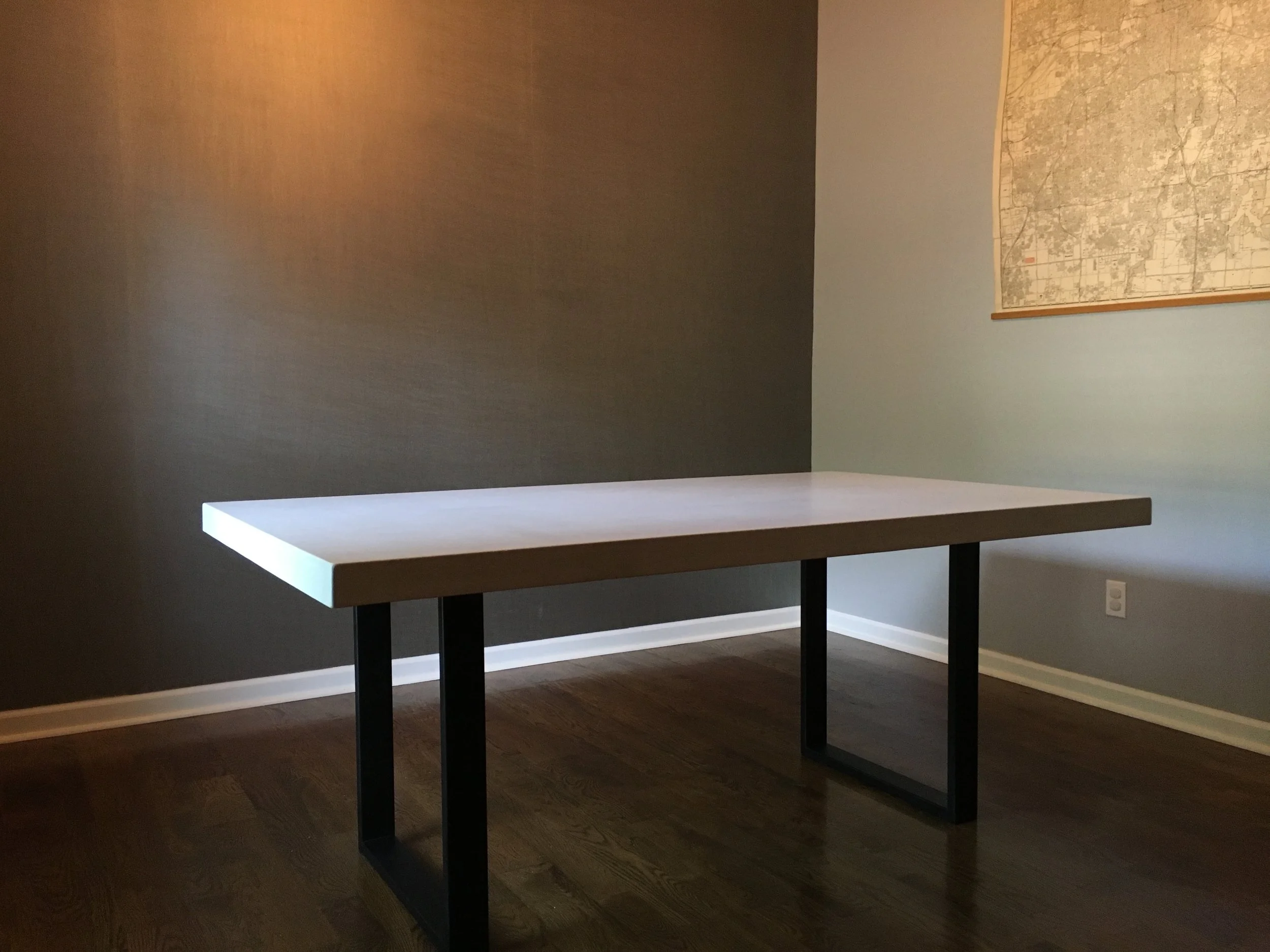 Modern Dining Table - White Concrete and Steel Base