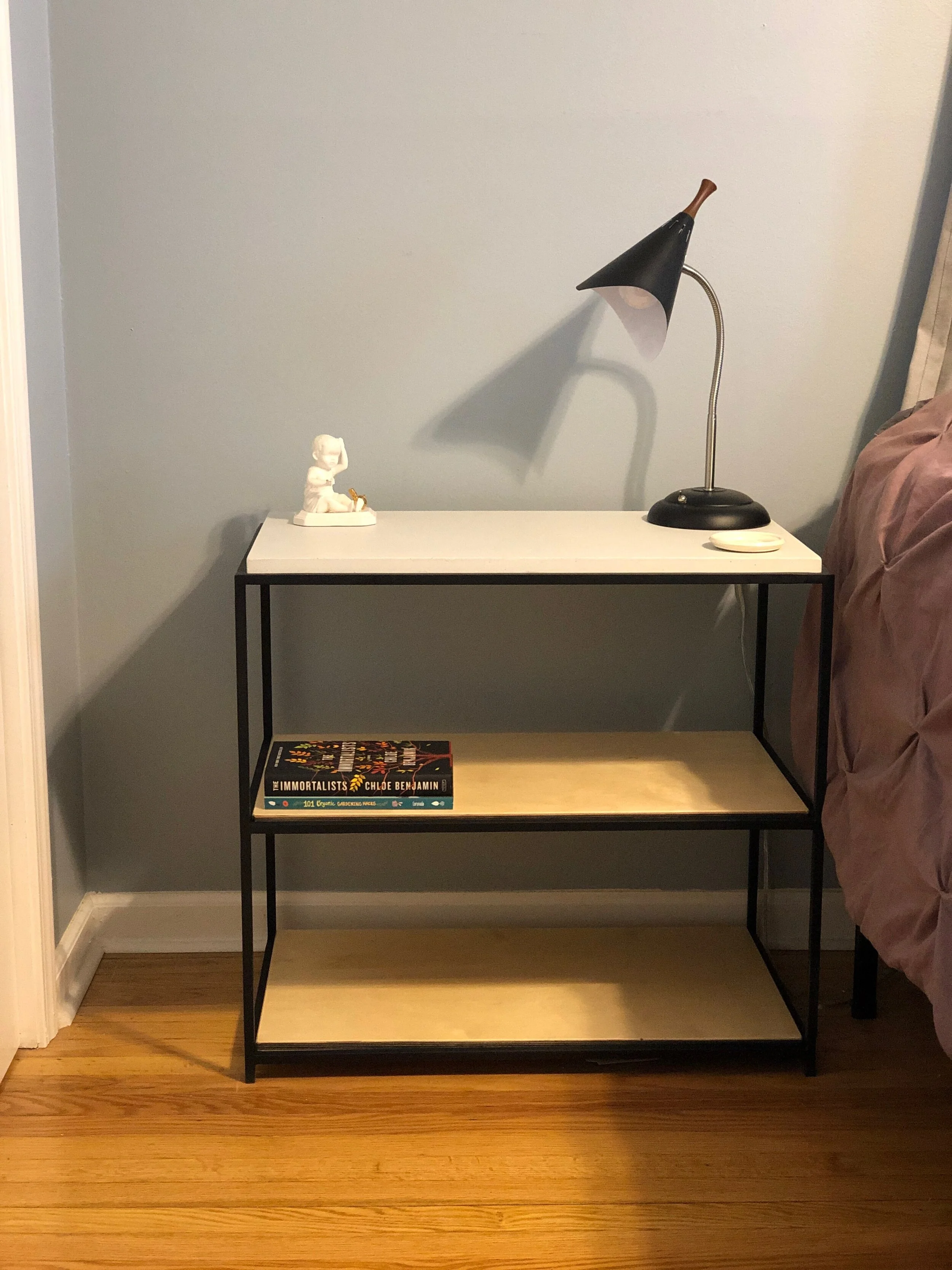 The Cydney Table in Titanium White, Steel Frame and Baltic Birch Shelves