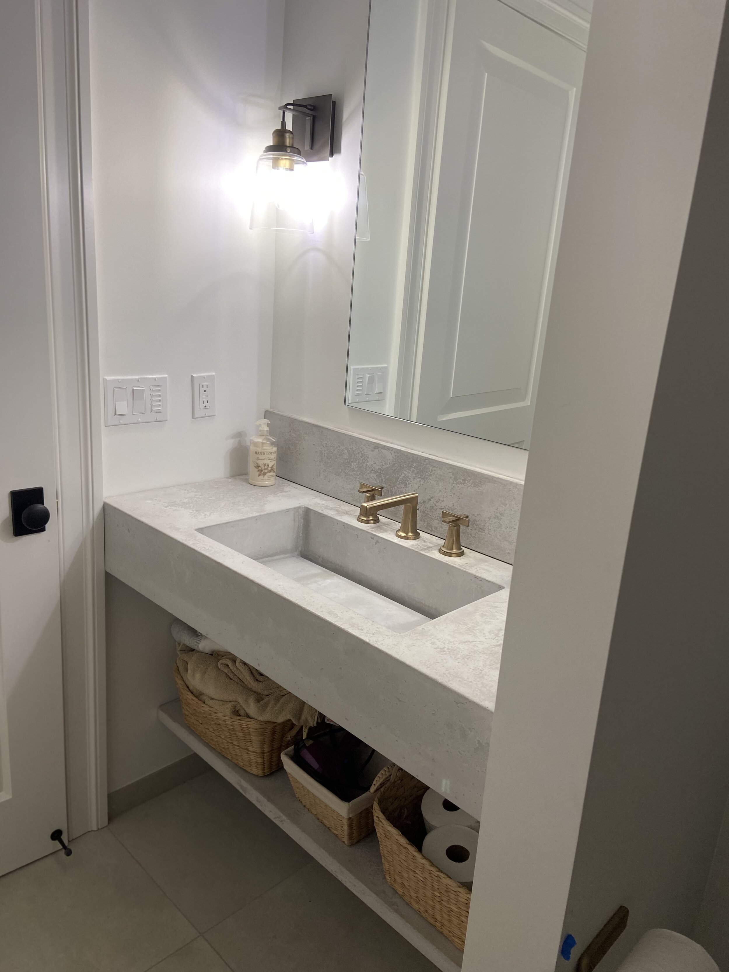 Floating Vanity sink and slot drain with a 7" apron front and floating under shelf