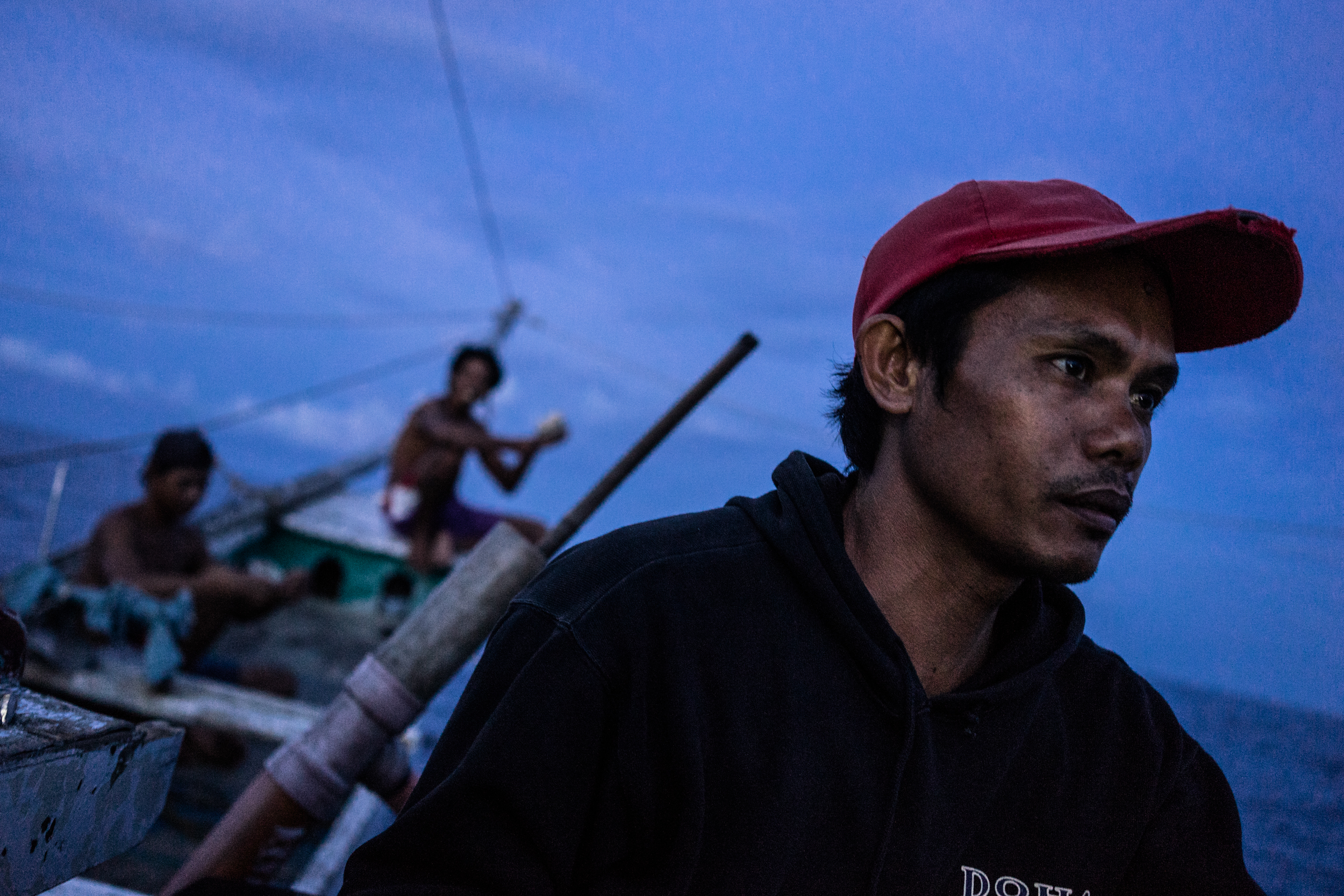  Kalibo, Philippines - September 21, 2015: Conrad Banihit is seen in a local fishing boat in Kalibo, Philippines. Because of the low wage he earns, Conrad decided to go aboard a Taiwanese fishing vessel, to which he was illegally recruited, then abus