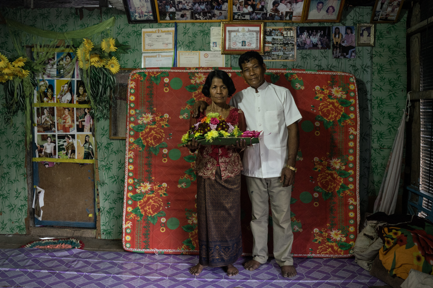 A portrait of groom Morb Heang and bride Nou Sout in their home a day before their wedding ceremony, held for victims of forced marriages by the Khmer Rouge. Several couples have decided to have a formal wedding ceremony almost four decades after their forced marriage, a crime which is today being tried as a crime against humanity by a war crimes tribunal.