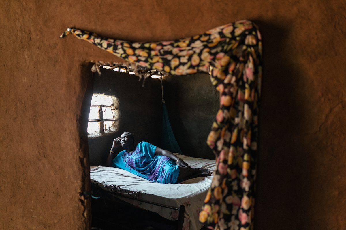 A portrait of a woman who was raped on her way to get firewood. In South Sudan, women and girls displaced from war must leave protection of civilians sites to collect firewood - a task traditionally done by women, who make up majority of the population in these camps. The journey is perilous and puts these women at continued risk of sexual violence, which rights groups have called an 'epidemic' in the country.