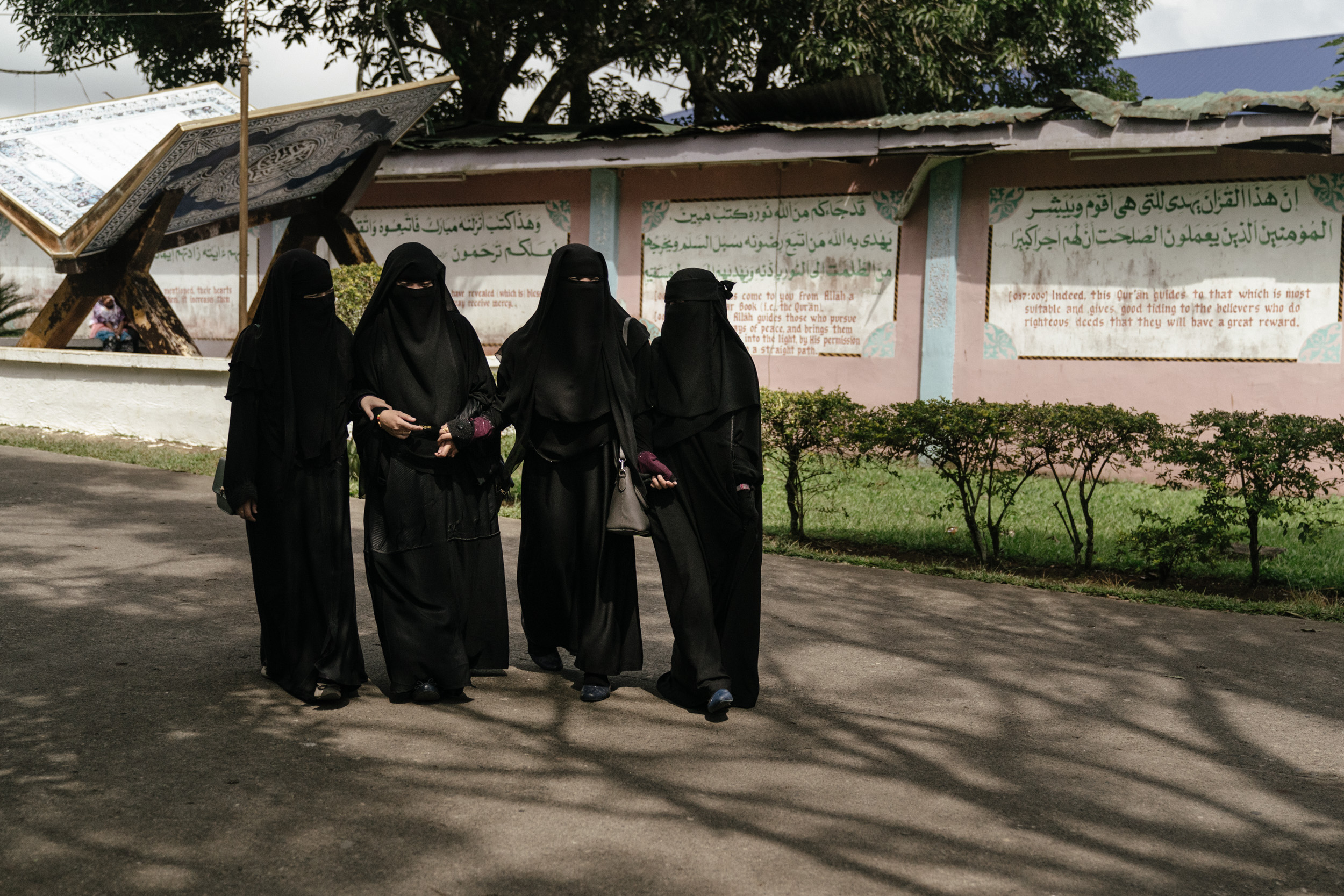  Aishah, Helyah, Najmah, and Amerah are seen near a masjid after prayers. Aishah, Amerah, and Najmah were all in ground zero when the siege happened. For all of them, everything has changed since. 'I wish more people knew that Islam, truly, is for pe