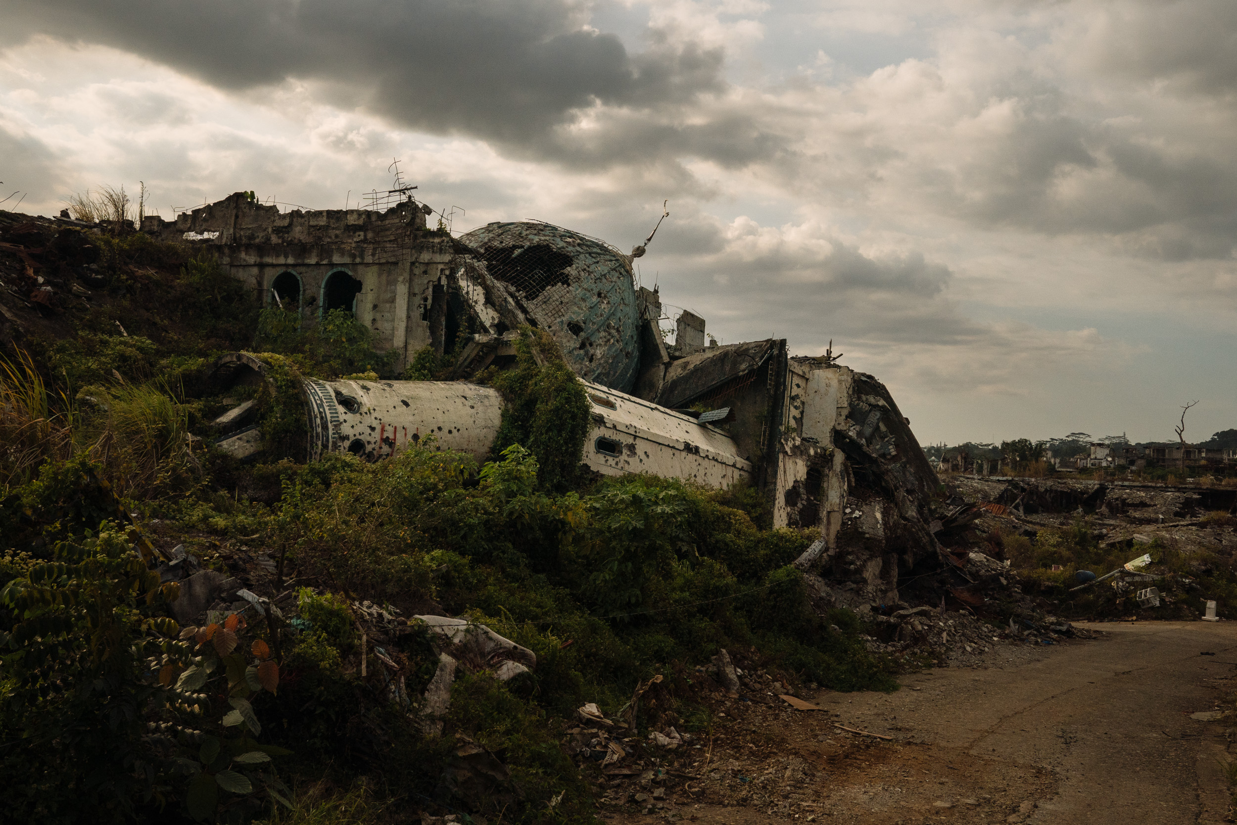  The ruins of a mosque are seen in the ground zero area of Marawi City. It has been more than a year since the Philippine military declared the Muslim-majority city of Marawi “liberated” from ISIS-linked militants, but the city remains a ghost town, 