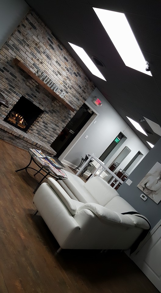 Rarely will you have to wait at Studio B, but just in case we have a full sectional in our lounge area. 