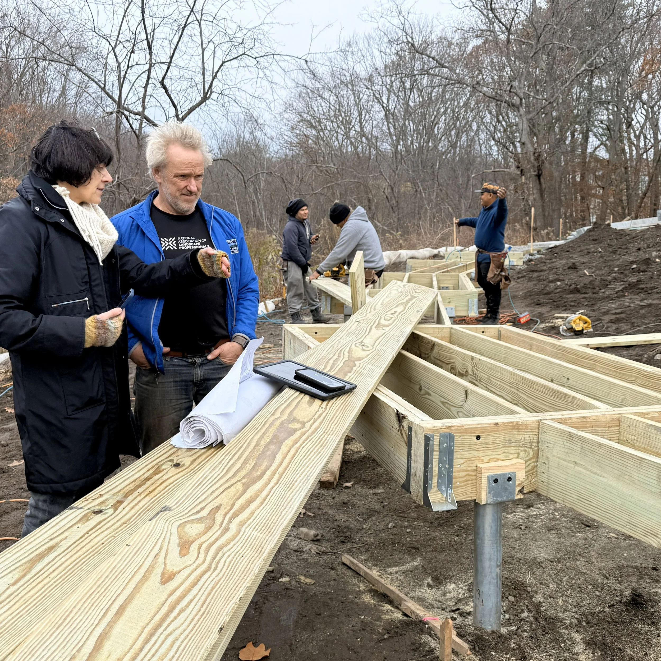 Nicole discussing boardwalk construction with Fred Anderson (Anderson Landscape Architecture Construction)