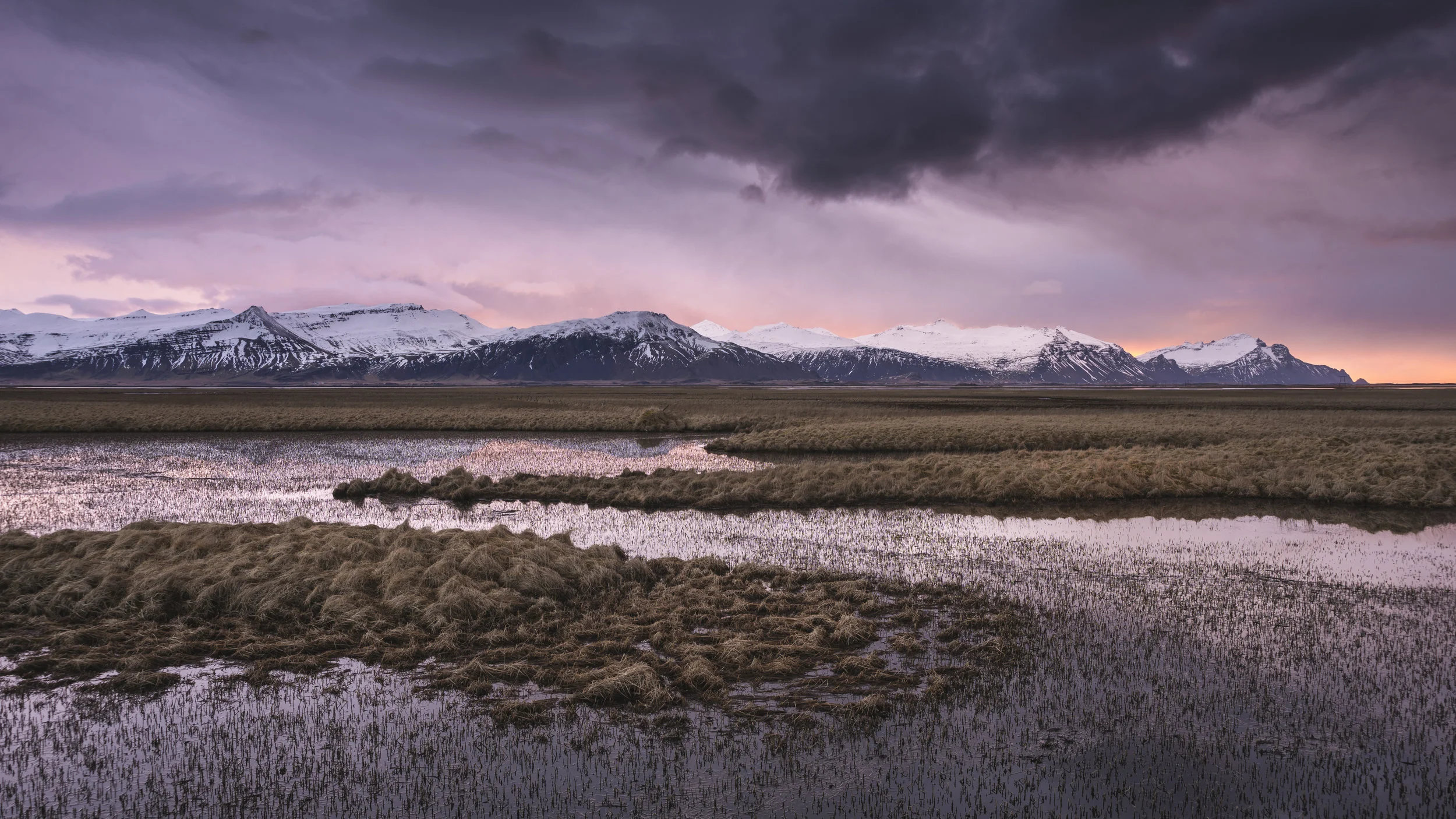 Sunrise over mountains and wetland, East Iceland
