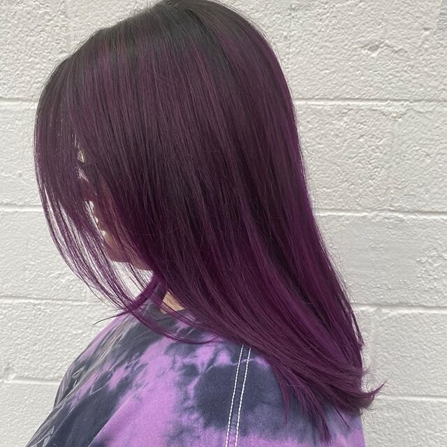 This lovely lady came to us in a pickle after using an at home hair color remover that left her hair in shambles! Luckily, Marla was able to salvage most of her length AND give her this vibrant violet and Jen finished off the look with a killer under