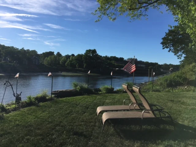 A great view of the Saugatuck River in Westport, Connecticut. Beautiful view and clean landscape with grasses, bushes, etc. We felt packing the landscape with annuals was't necessary. 