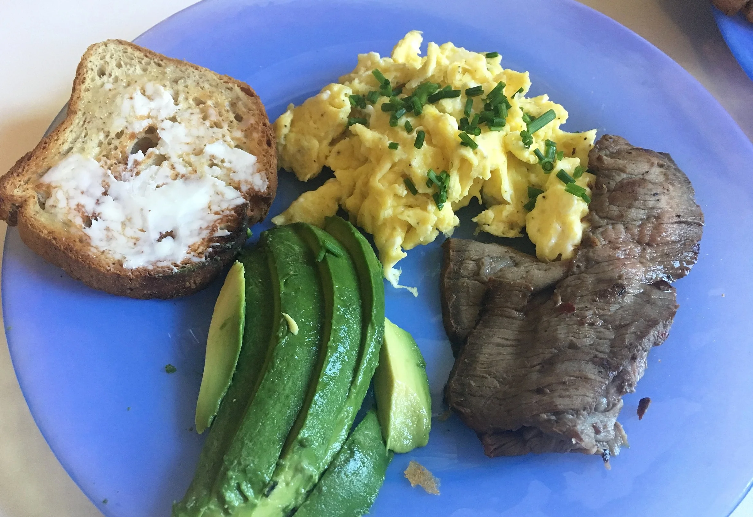 My next favorite is this recipe for chive scrambled eggs. Its so easy and can be paired with leftover steak and avocado like I had, or just on its own. It is super flavorful unlike some recipes for scrambled eggs. I actually used to HATE scrambled eggs, but now I could eat these every week.