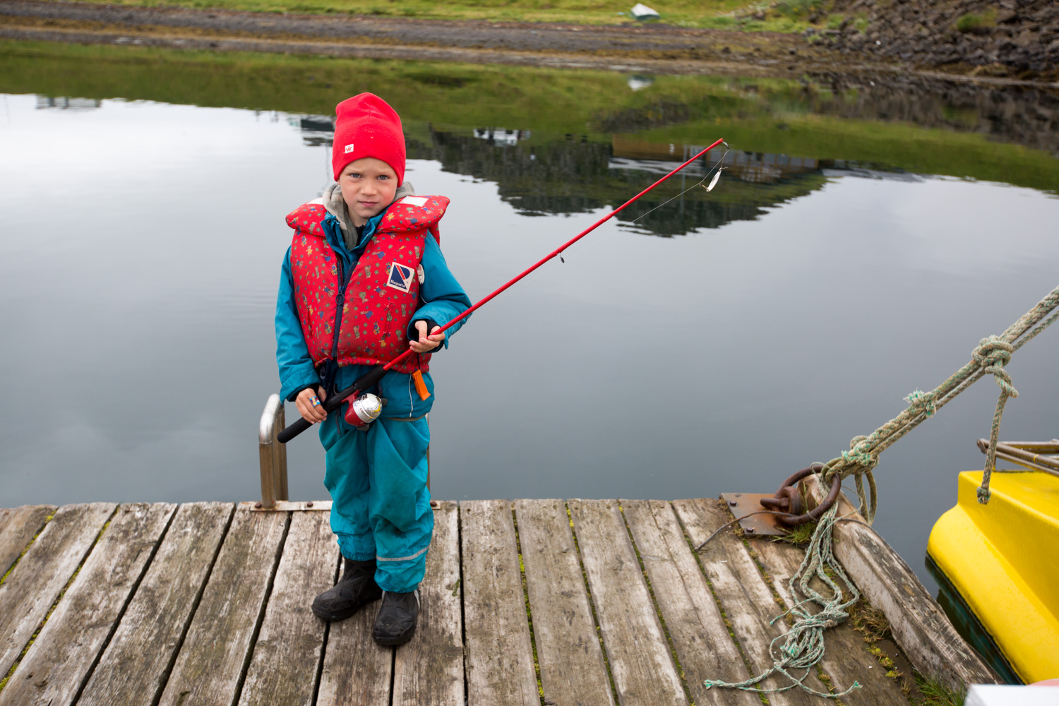 Eric Kruszewski photographs a fisherman in Iceland for National Geographic Student Expeditions.