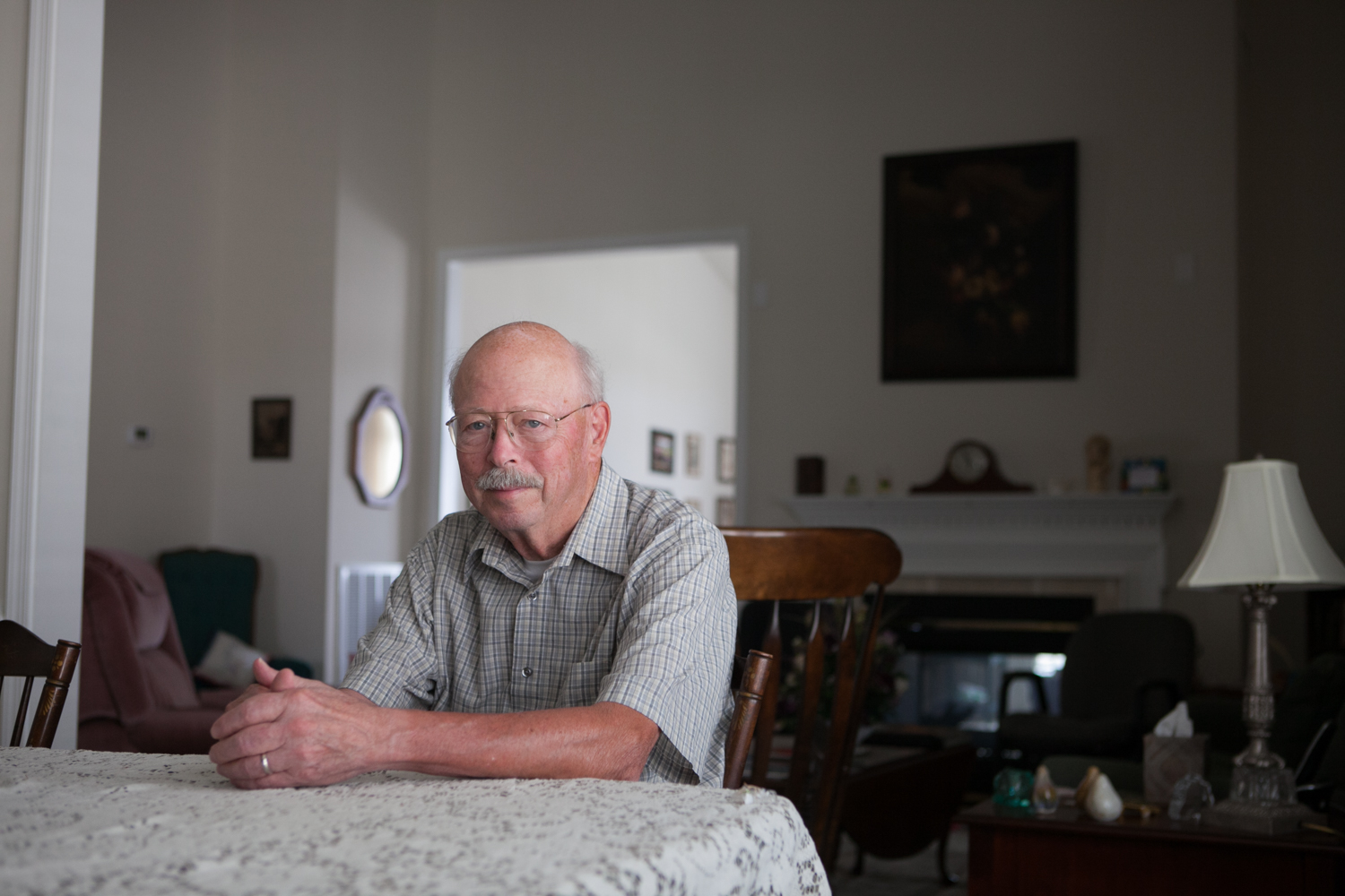 Washington, D.C. editorial photographer Eric Kruszewski photographs a portrait of caregiver, Yorke Nelson, for AARP.