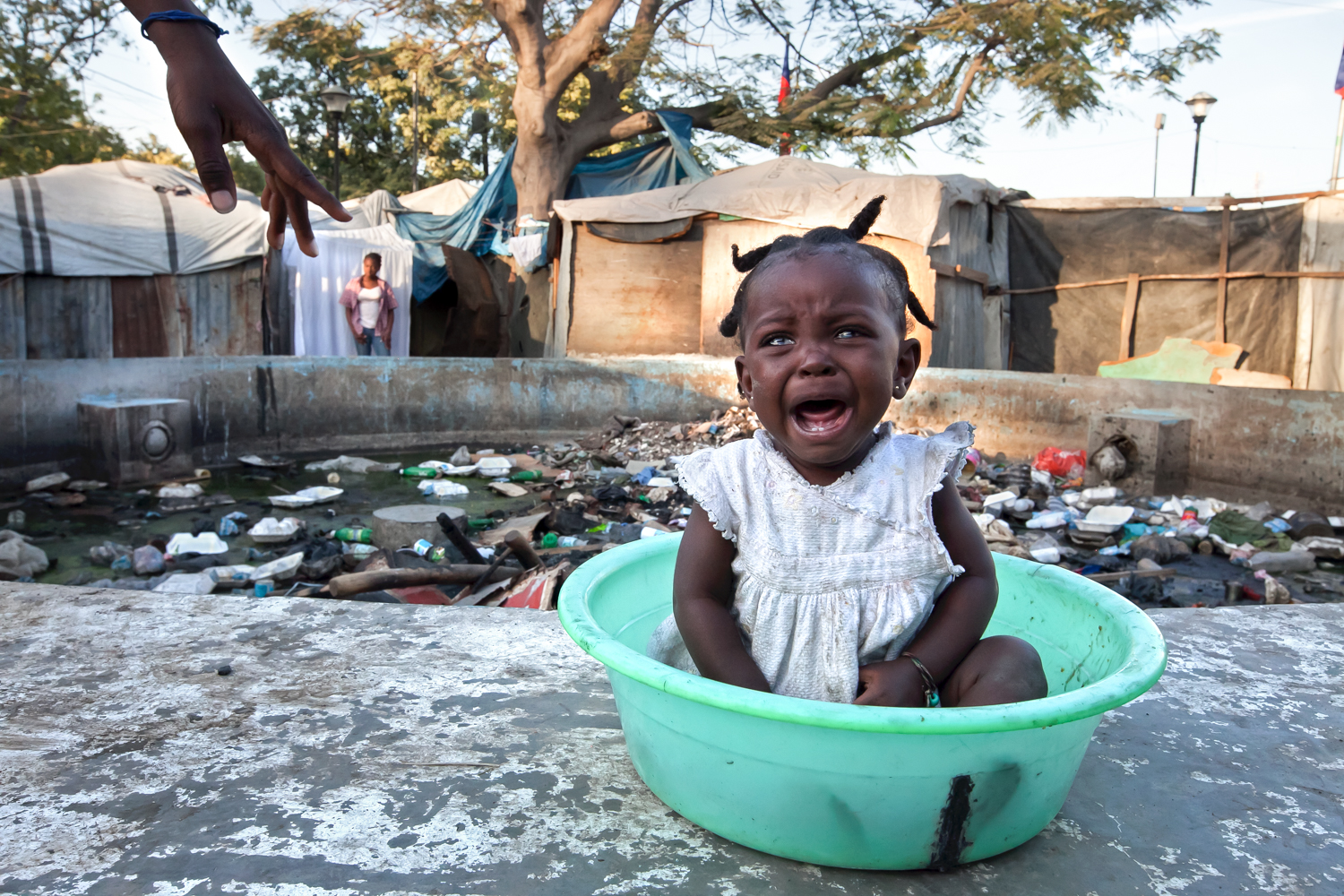  Many of Gramothe's residents have family members in Port-au-Prince and other large cities where the 2010 earthquake's consequences are still manifest almost everywhere. 