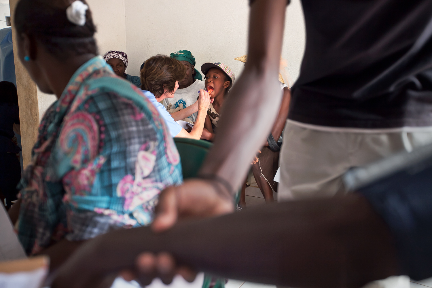  Villagers gather in the medical clinic corridor, where nurses take vital signs and perform preliminary exams before sending patients for further evaluation. Bacterial and viral infections, high blood pressure, malnutrition and arthritis are some of 