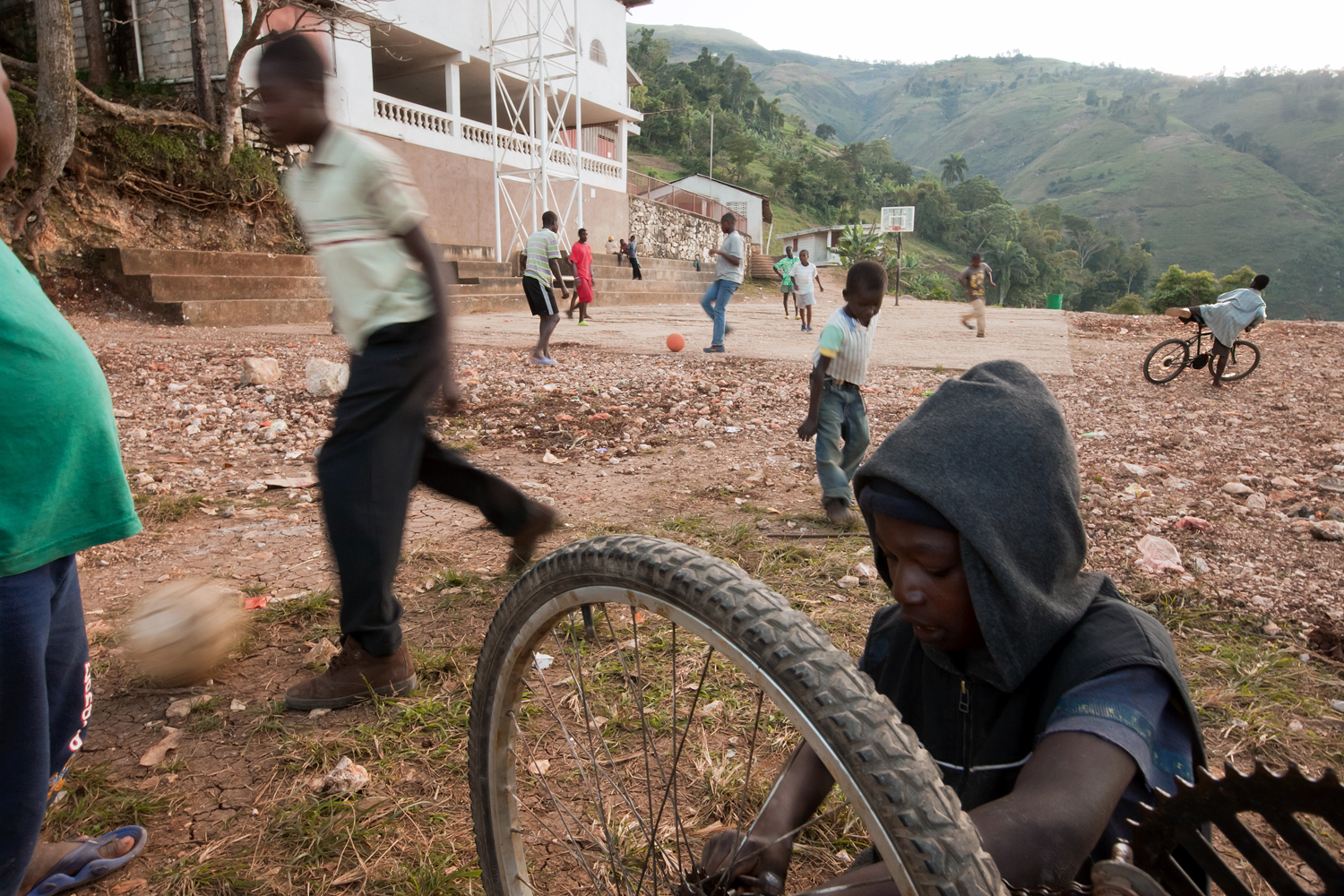  Outside Gramothe's church and school buildings, children have a safe place to play and interact with their friends and classmates. 