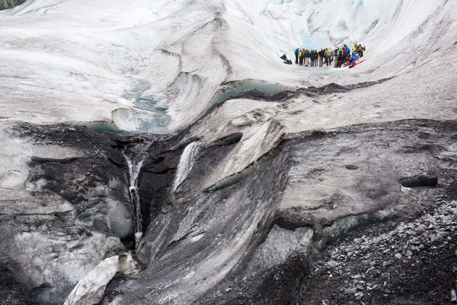  A group of high school students gather on Exit Glacier outside Seward, Alaska. The students are briefed on their upcoming ice climbing activity. 