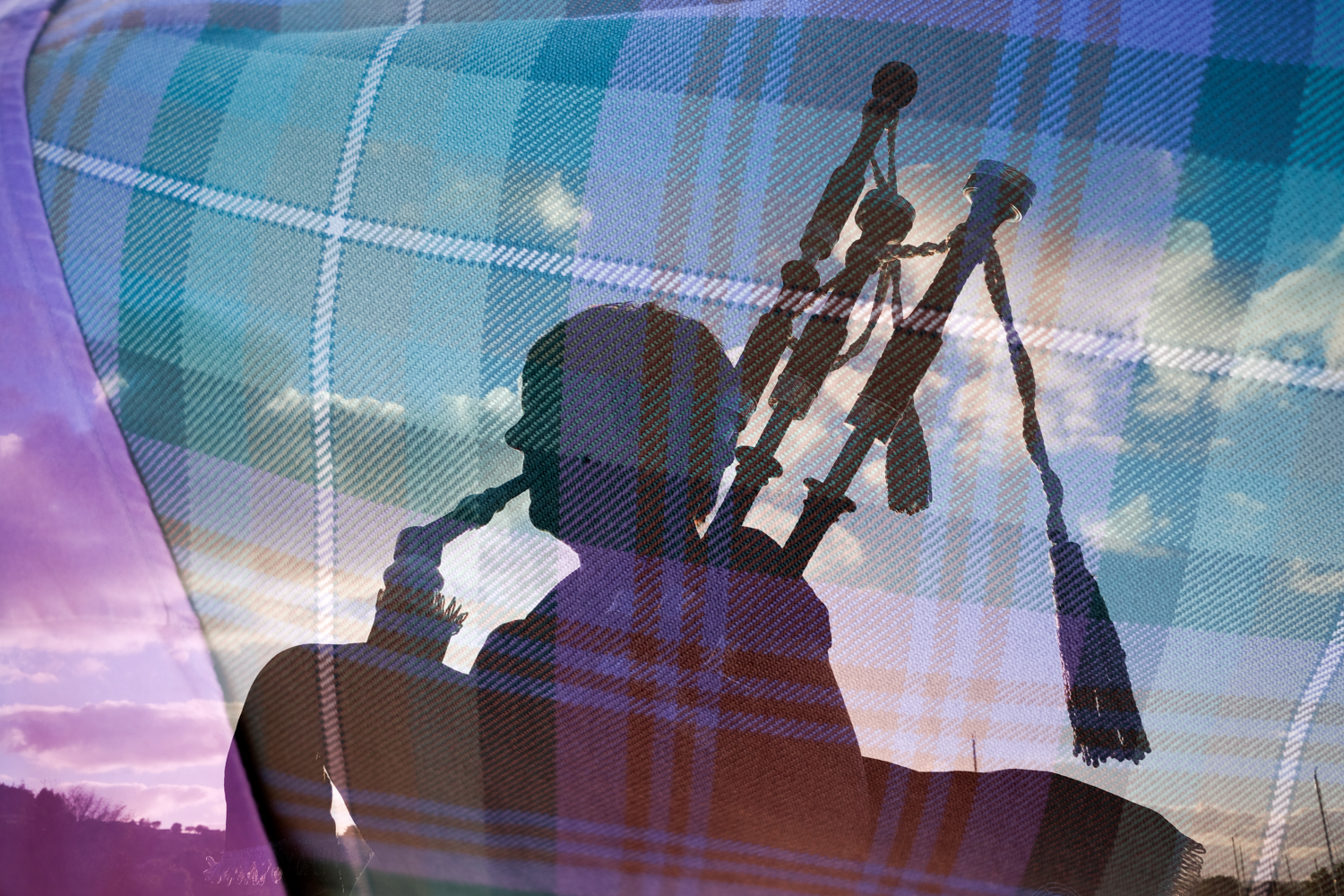  On our first day aboard Lord of the Glens, a bagpiper greeted us with amazing song. Here is a double exposure image of the bagpiper and her traditional tartan. 