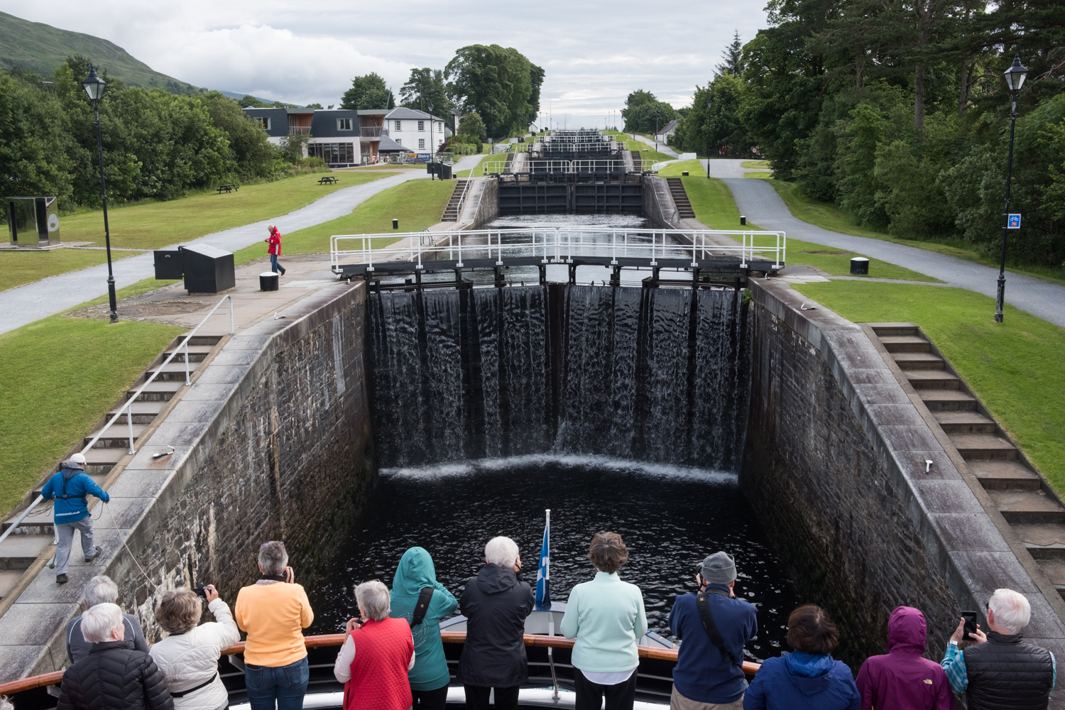  Guests gather on the bow of the ship to watch it ascend Neptune's Staircase, a sequence of eight locks along the Caledonian Canal. 