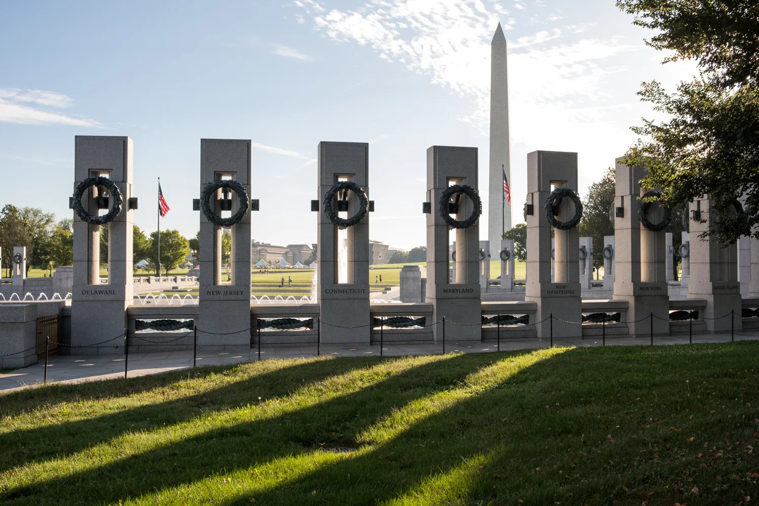 The World War II Memorial in Washington, D.C. casts long shadows in the morning light.